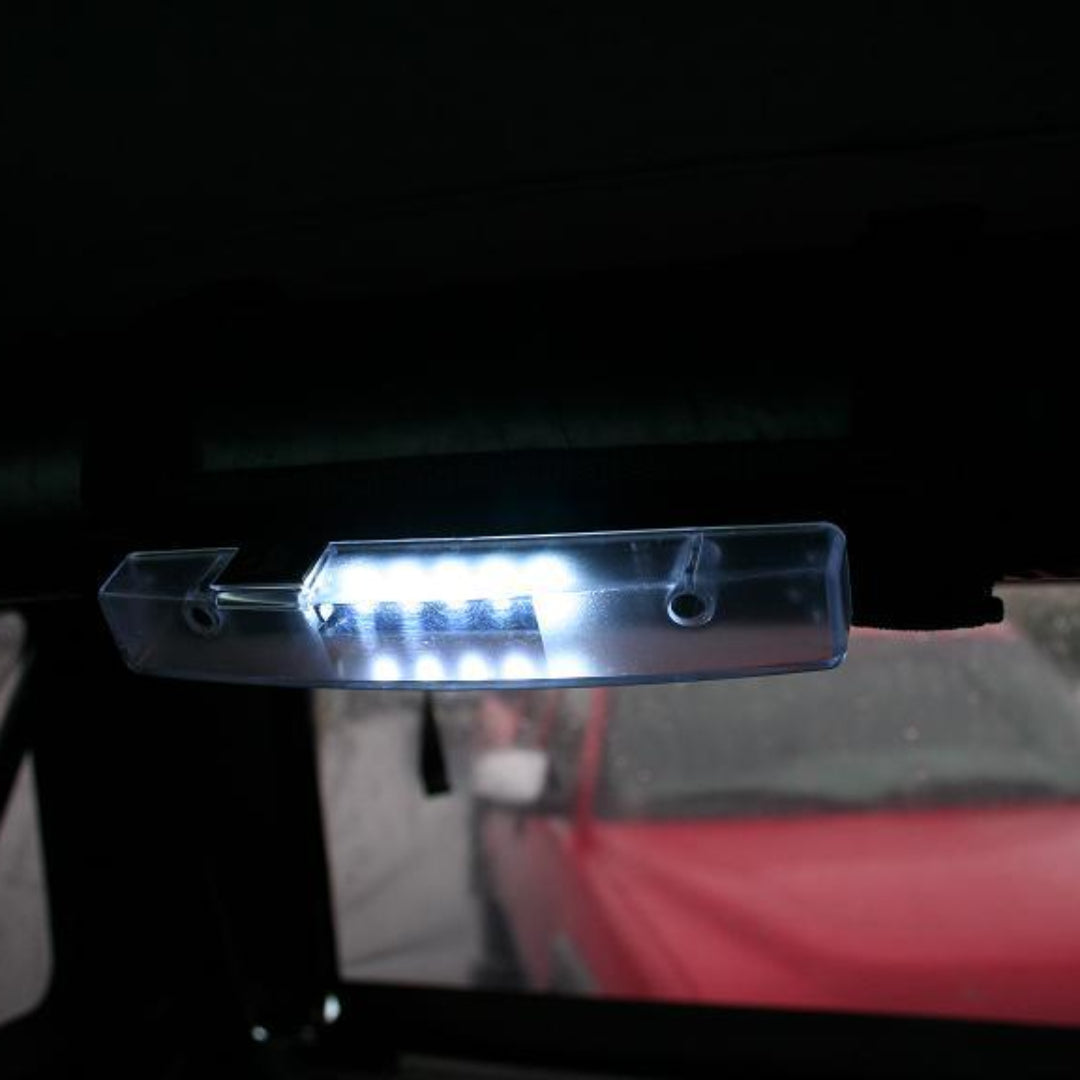 Black LED light bar with aluminum housing and mounting brackets, front view