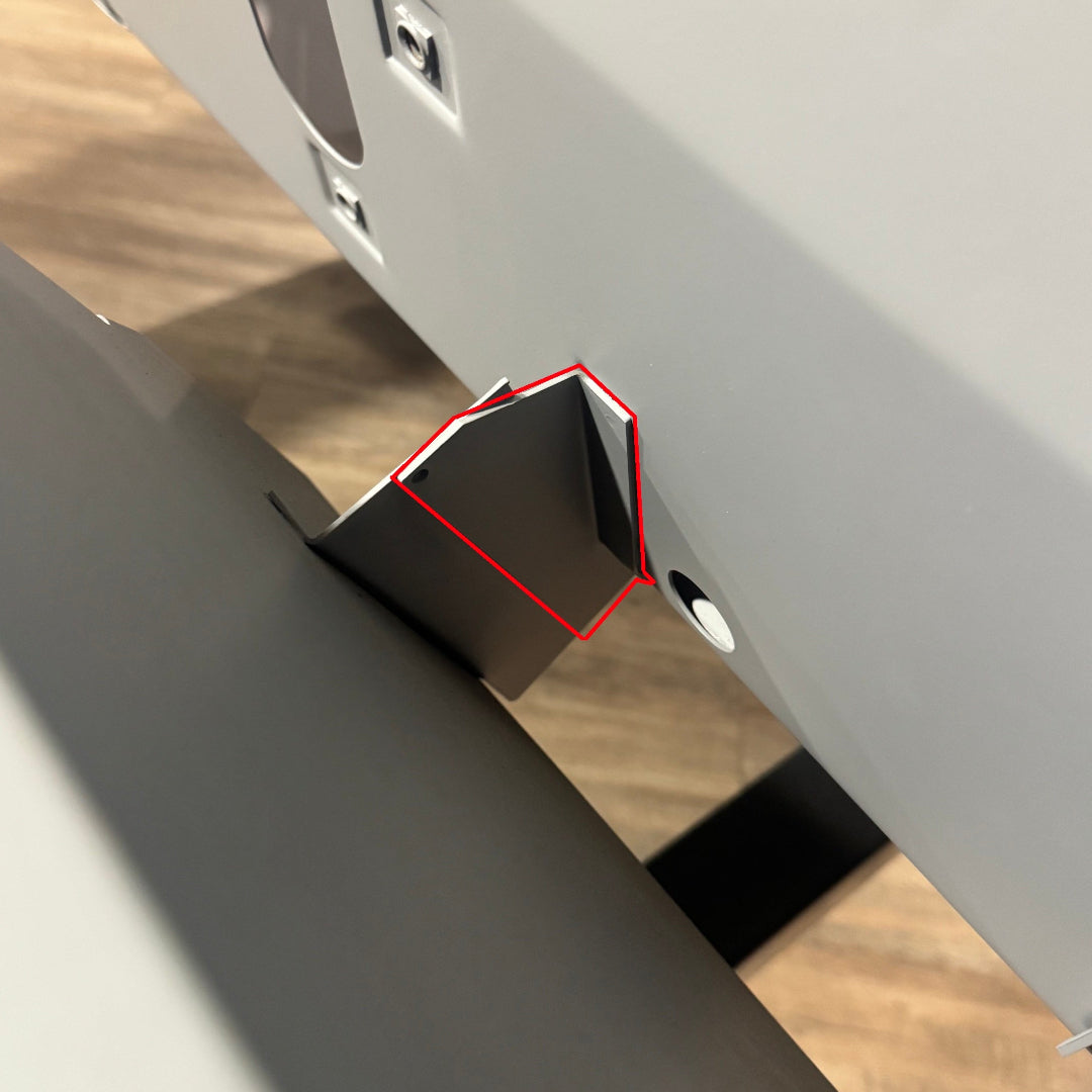 Black metal firewall support bracket with bolt holes, side view