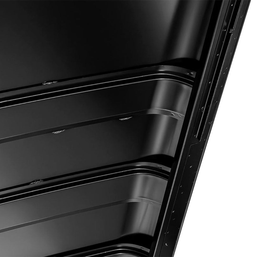 Black hardtop roof panel with drip rail and four bow system, side view