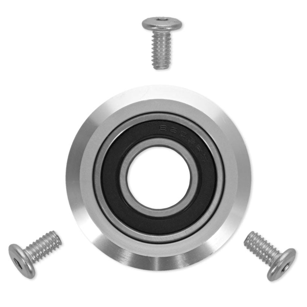 Billet aluminum steering column bearing with machined finish, side view