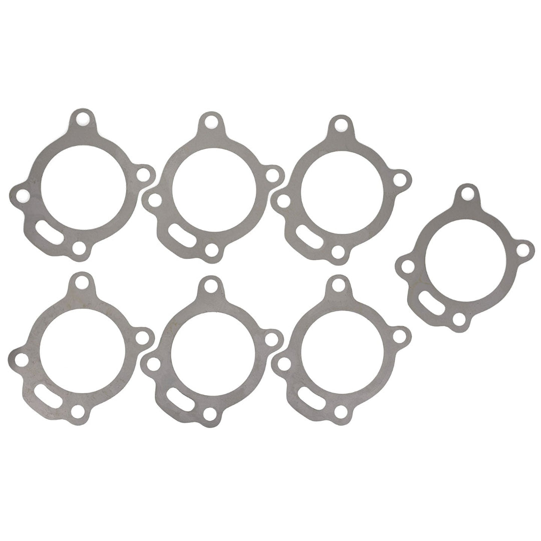 Set of silver transfer case shims with precision-cut edges, detail shot