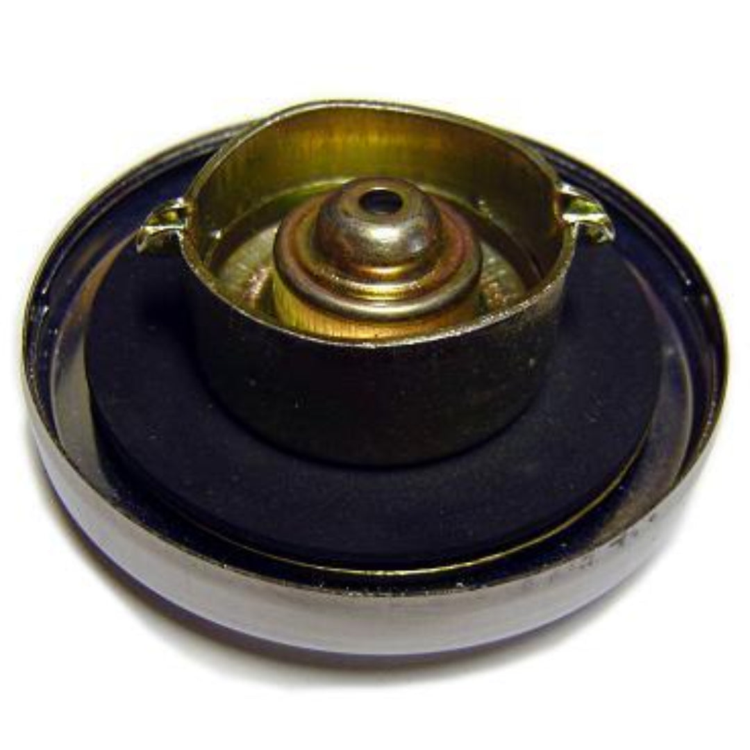 Polished metal fuel cap with extended neck, side view
