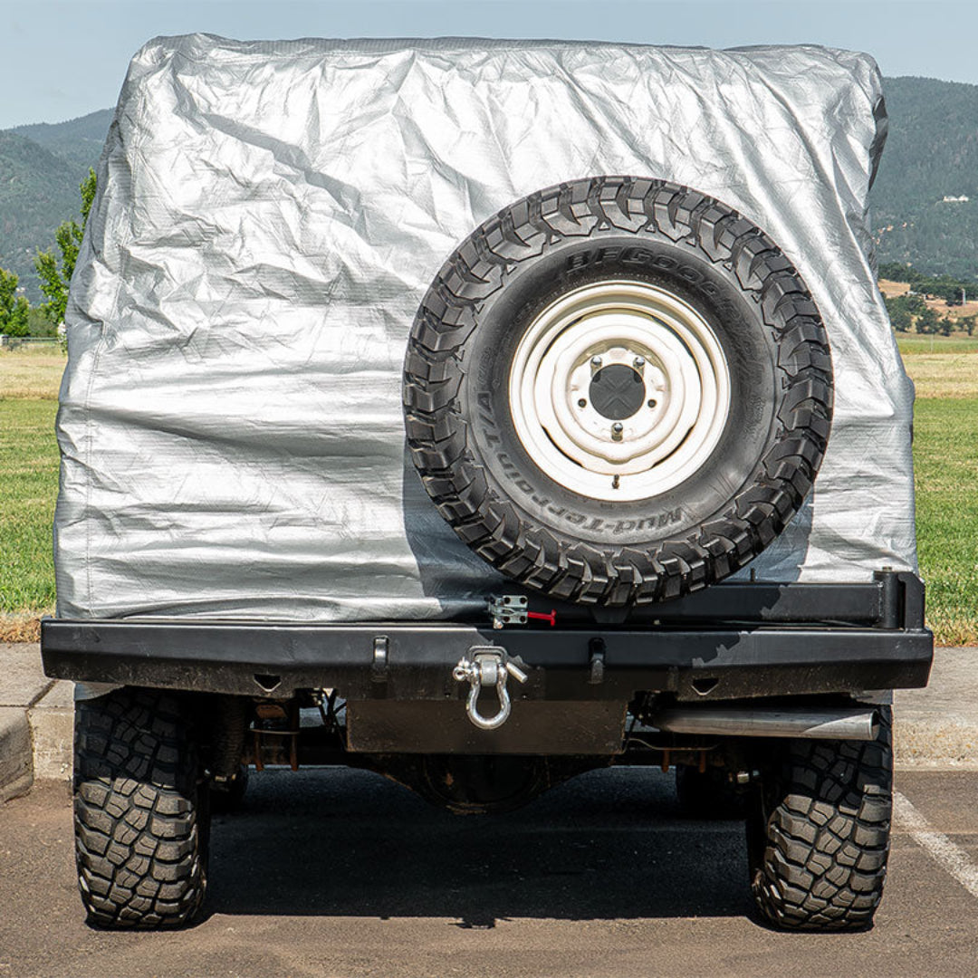 Gray car cover with elastic hem and front logo, fitted for Ford Bronco without spare tire, front vie