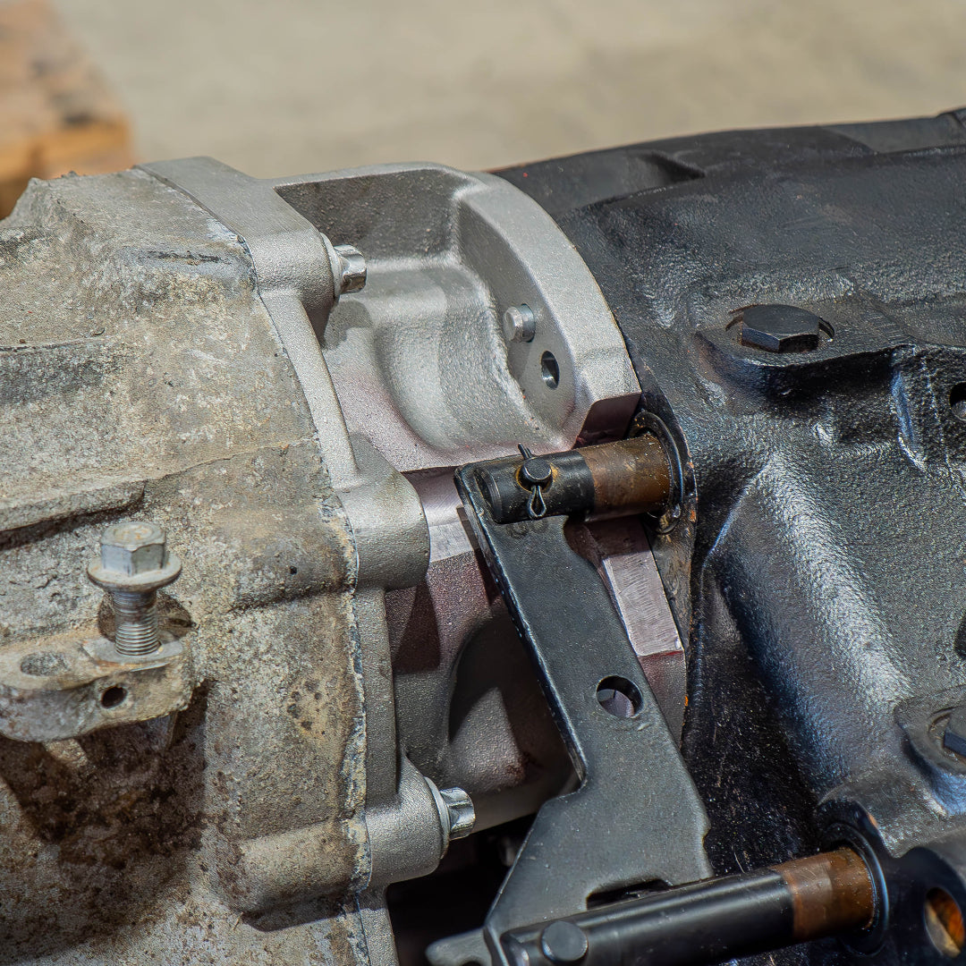 Metal adapter plate with bolt holes, side view