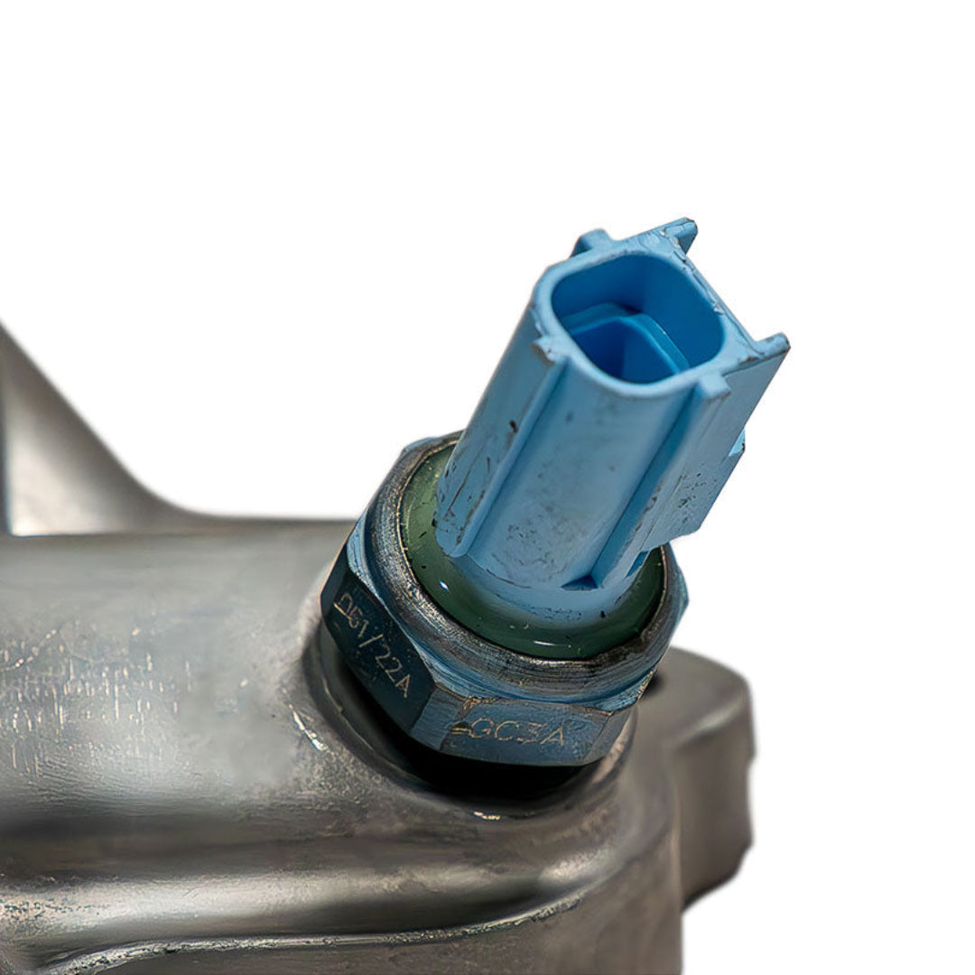 Black aluminum oil filter adapter with threaded ports, front view