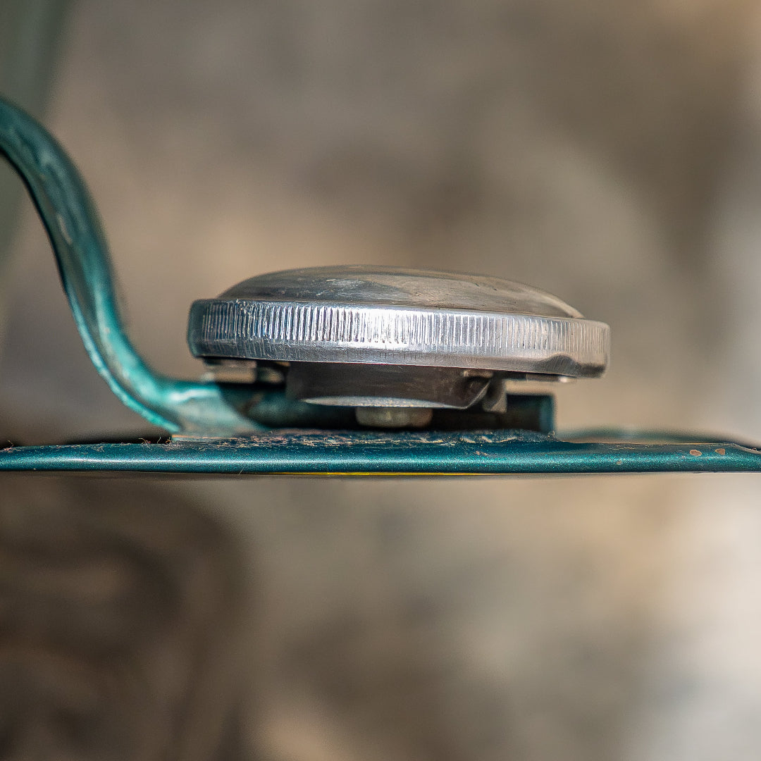 Metal gas cap holder for classic Ford trucks, side view