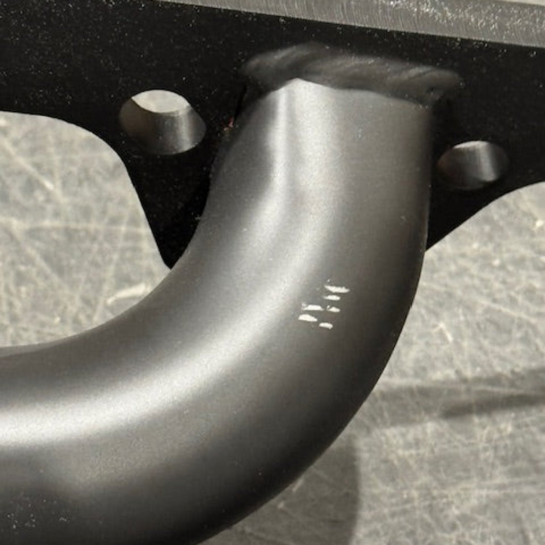 Black ceramic-coated stainless steel headers with long tube design, front view