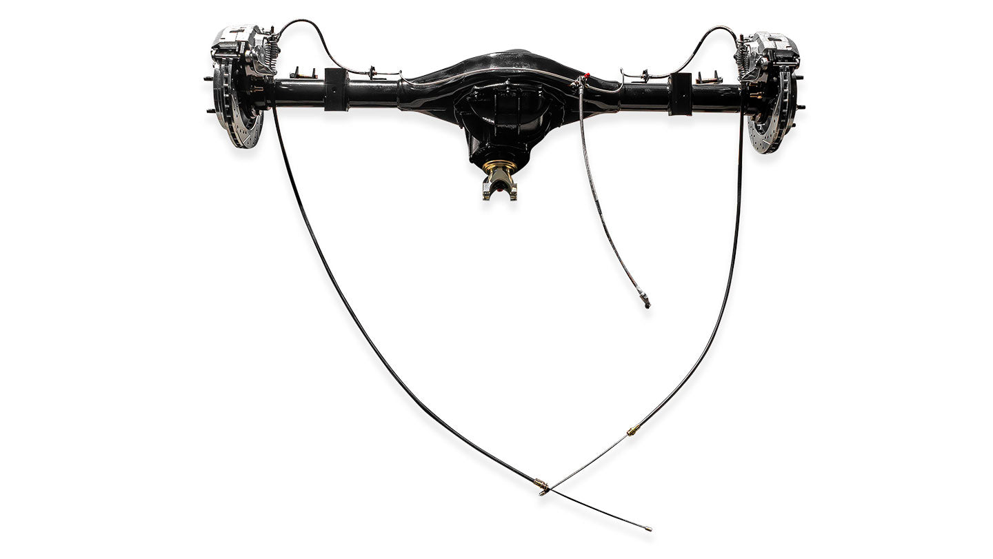 Ford 9-inch rear differential assembly with axle housing and gearset, side view