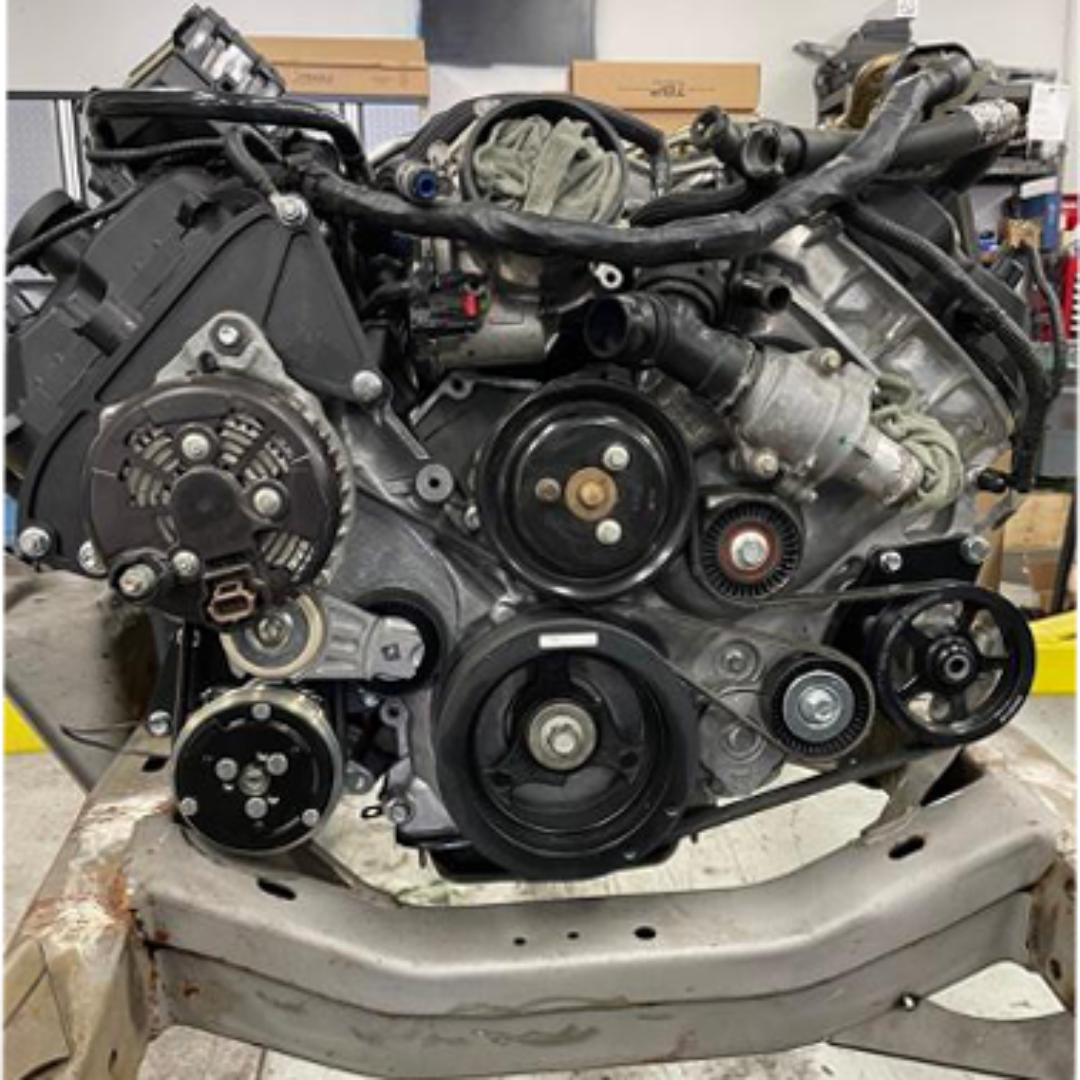 Bronco front drive kit with A/C compressor and pulley system, front view