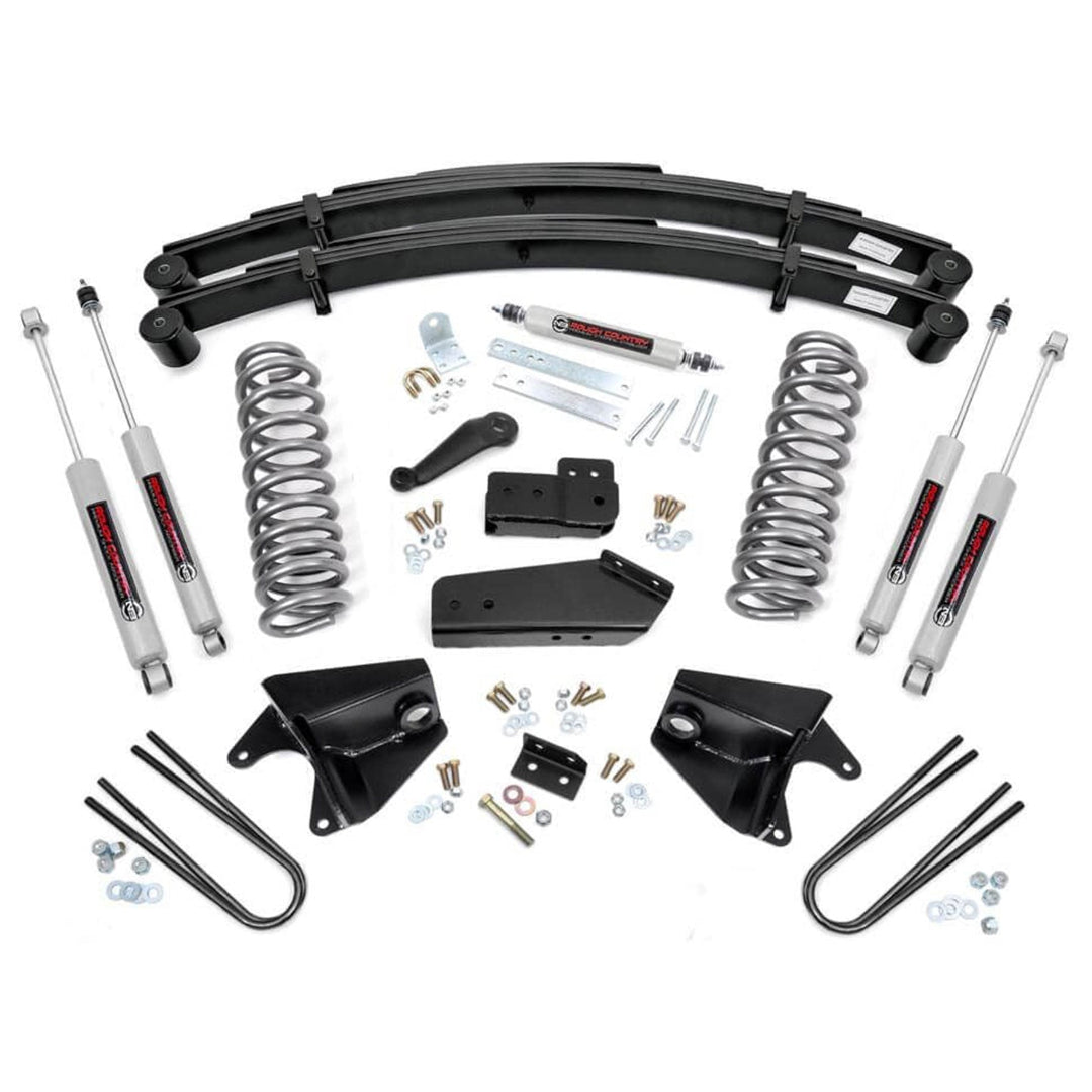 Black steel rear lift springs for truck suspension, side view