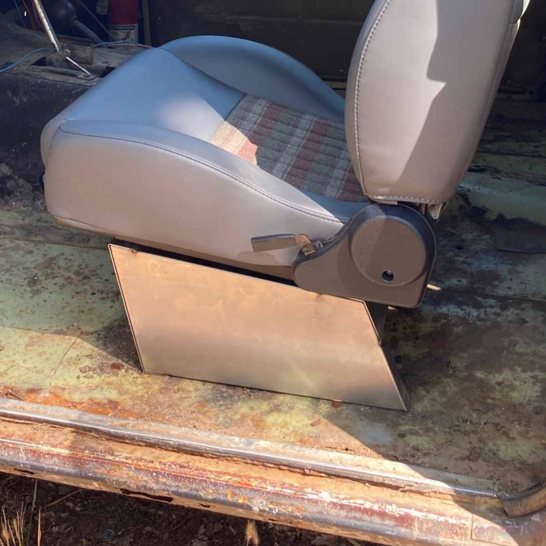 Black steel front seat brackets with mounting holes, side view