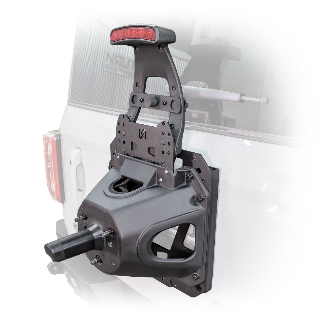 Black steel tire carrier kit with mounting brackets, side view