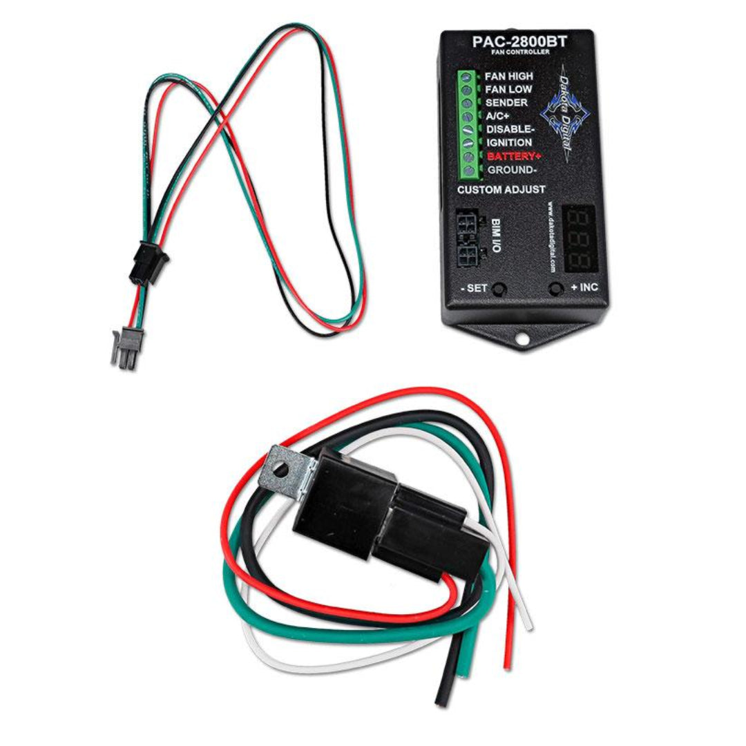 Black electric fan controller module with labeled ports and mounting holes, front view