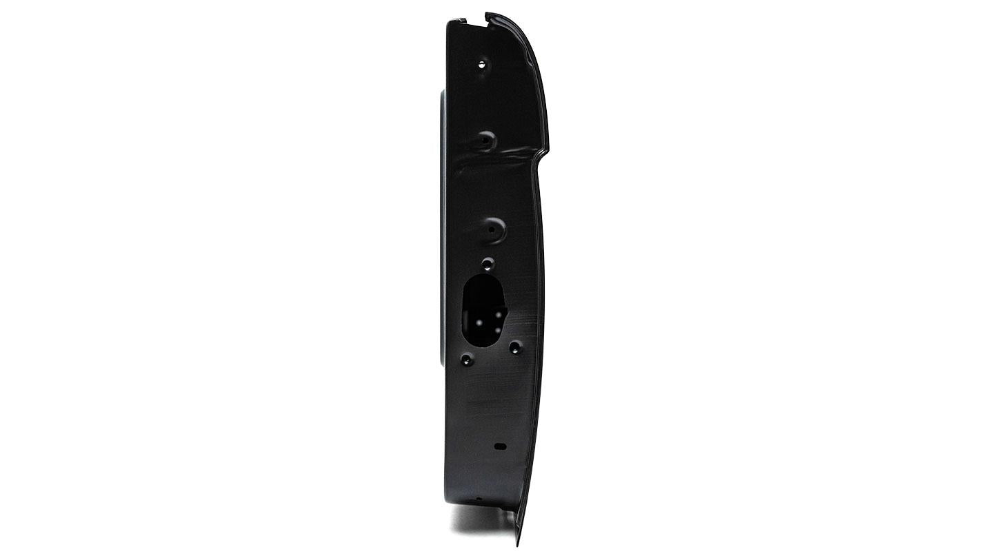 Bronze metal door shell with bolt holes and textured finish, side view