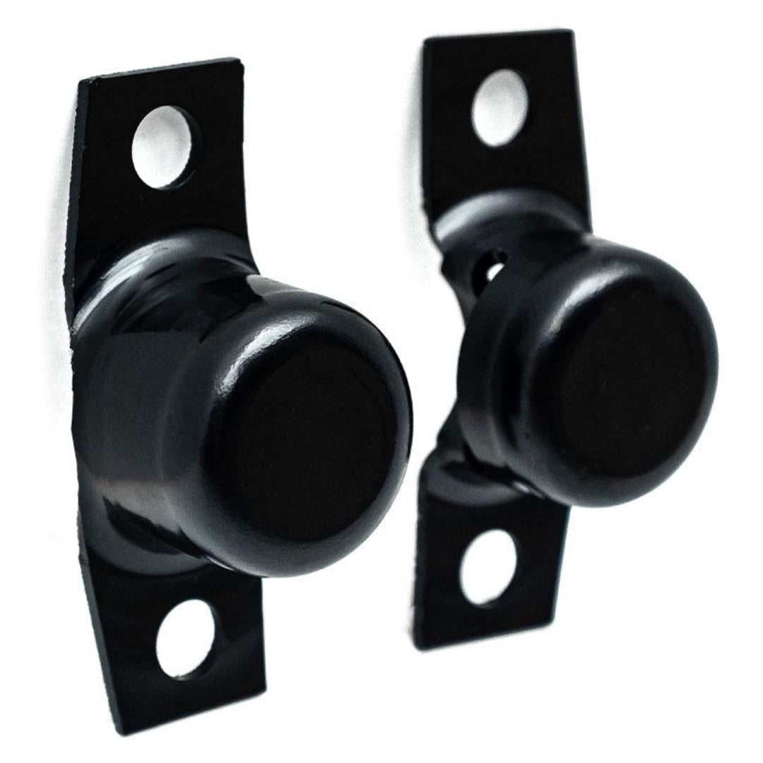 Pair of black steel tailgate hinges for Ford Bronco, side view showing pivot mechanism
