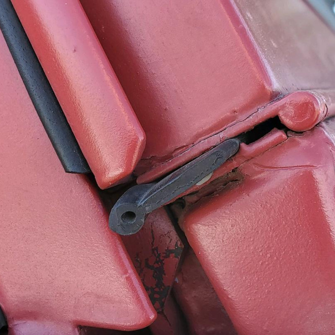 Black rubber windshield hinge seal for classic Ford Bronco, side view
