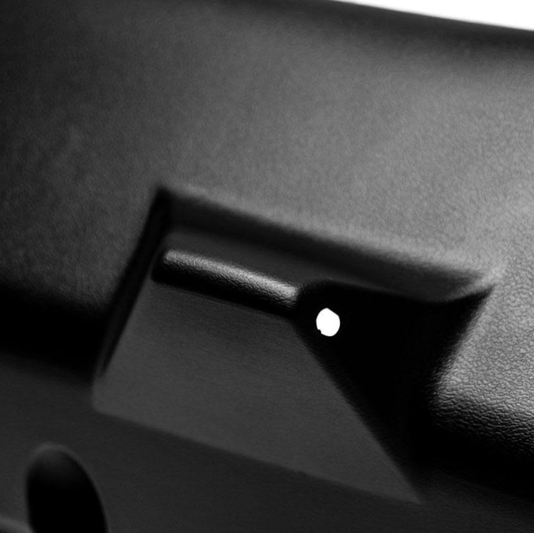 Black rubber wiper cover for classic Ford Bronco, side view showing textured surface