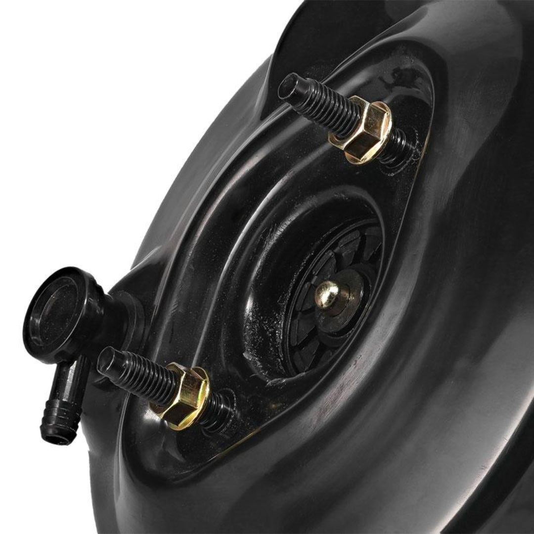 Silver brake booster with vacuum hose port, front view