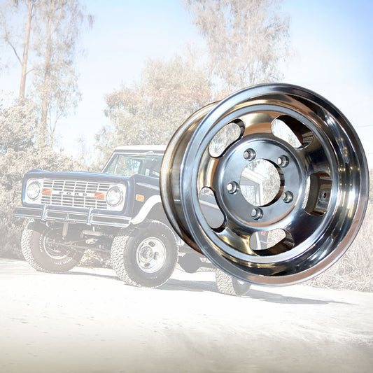 Polished aluminum slotted wheel with 5x5.5 bolt pattern, front view