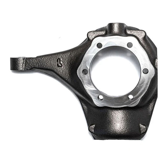 Black steel knuckle with pre-drilled holes for disc brake conversion, side view