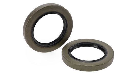 Pair of black rubber spindle seals for Dana 30 axle, side view
