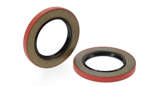 Pair of black rubber spindle seals with metal inserts, front view