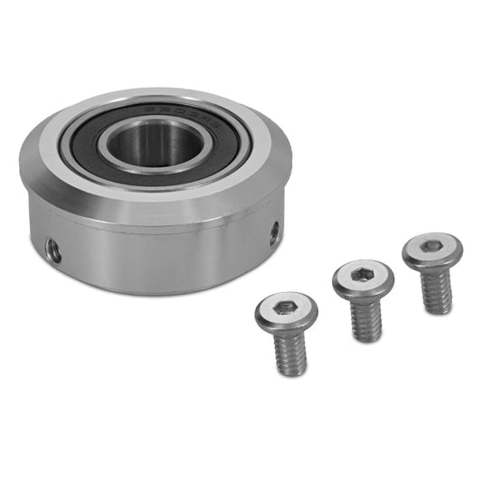 Polished aluminum steering column bearing with mounting holes, side view