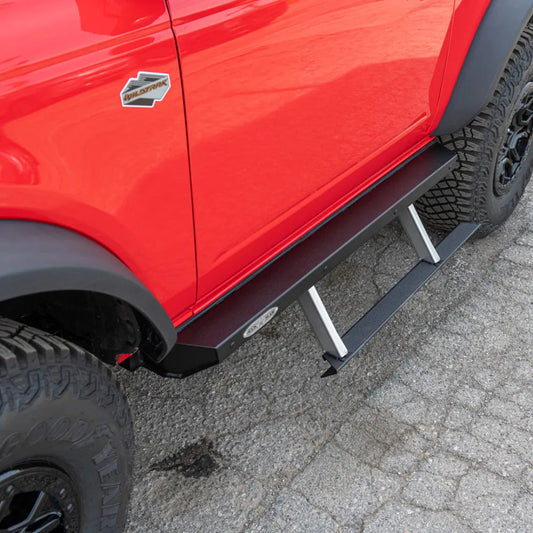 Black steel step sliders with textured tread plates for Ford Bronco, side view