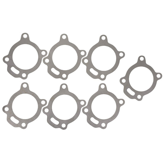 Set of silver transfer case shims with precision-cut edges, detail shot