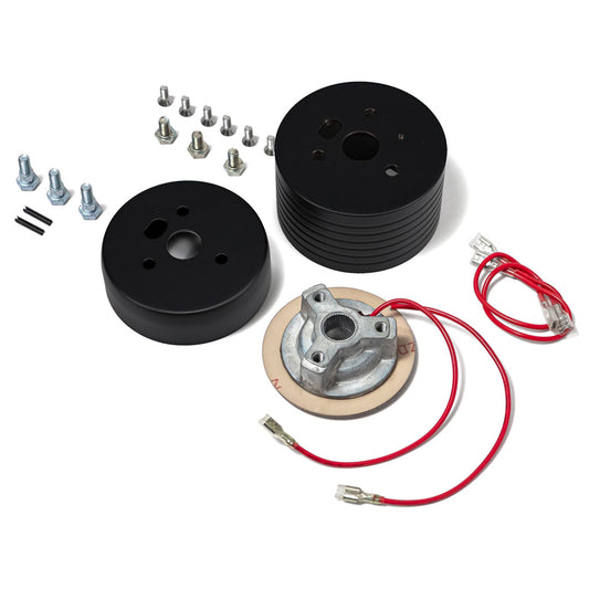 Black steering wheel hub with adapter, close-up detail shot