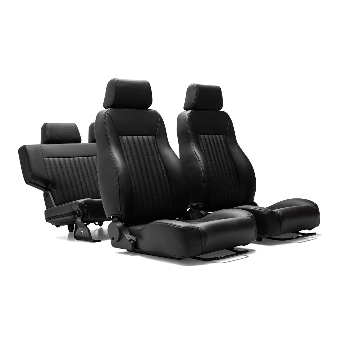 Black leather car seats with diamond stitching and adjustable headrests, front and rear view