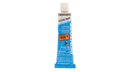 Gray RTV silicone sealant tube with red cap, detail shot