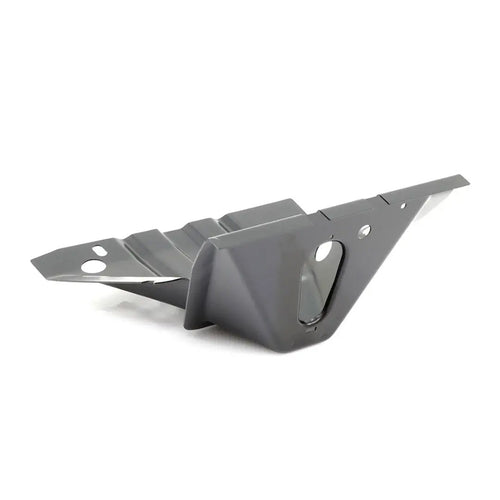 Black rubber cab mount with metal washers and bolt holes, side view