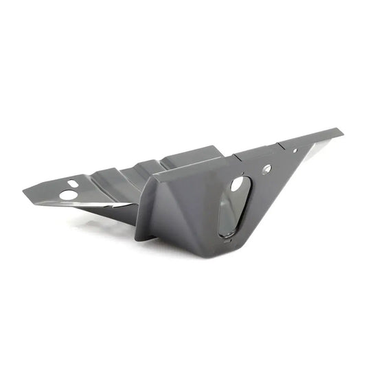 Black rubber cab mount with metal washers and bolt holes, side view
