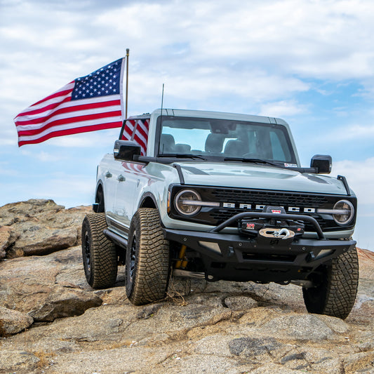 Black metal flag mount with adjustable clamps for Ford Bronco, side view