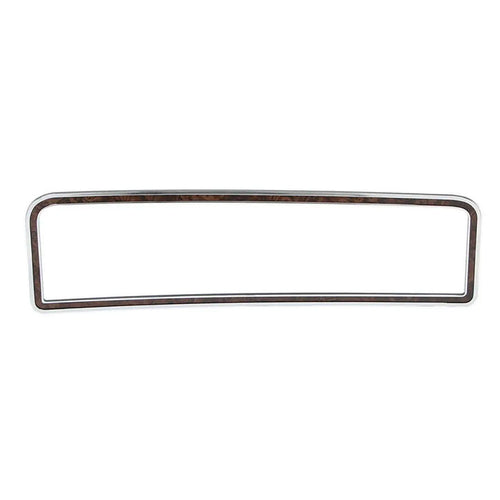 Chrome and woodgrain glove box door trim with textured finish, front view