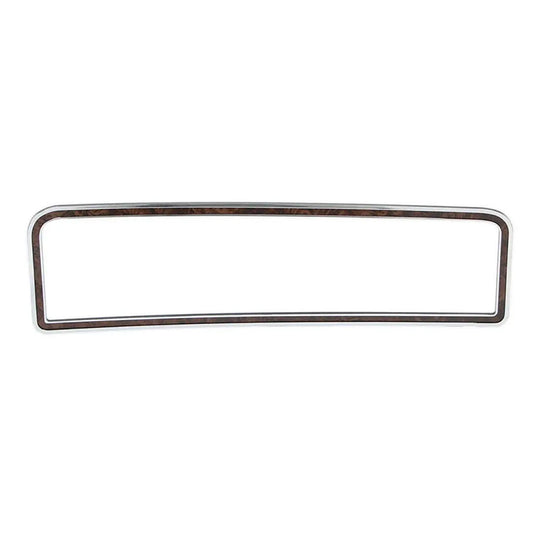 Chrome and woodgrain glove box door trim with textured finish, front view