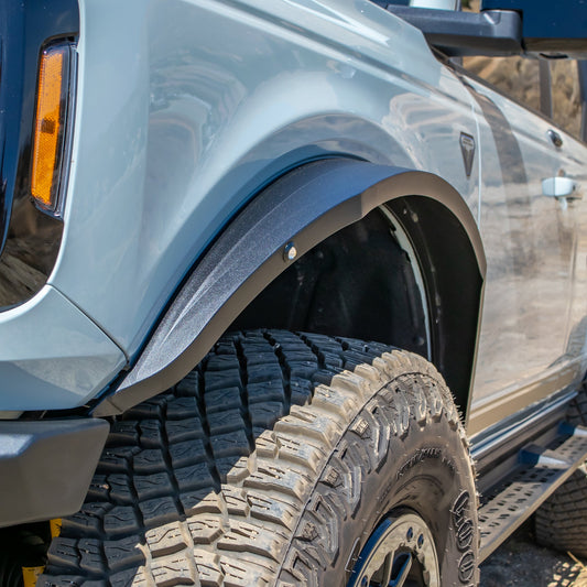 Black steel fender flares with integrated marker lights for Ford Bronco, side view