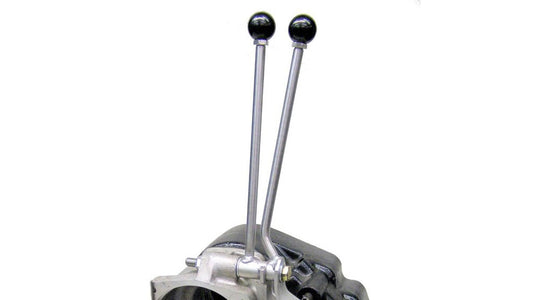 Black T-style twin stick shifter with textured knobs for AOD and AODE transmissions, front view