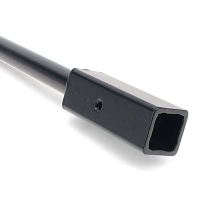Black shift handle with textured grip and TOMS OFFROAD logo, top view