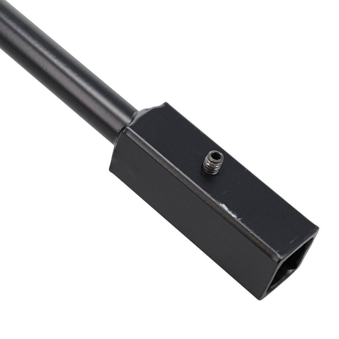 Black shift handle with textured grip and TOMS OFFROAD logo, side view