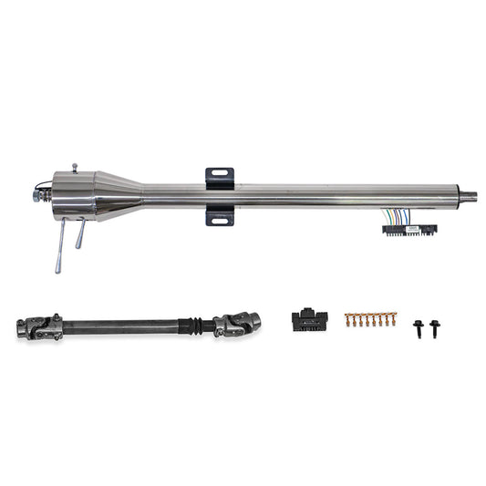 Polished tilt steering column with manual floor shift mechanism, close-up detail