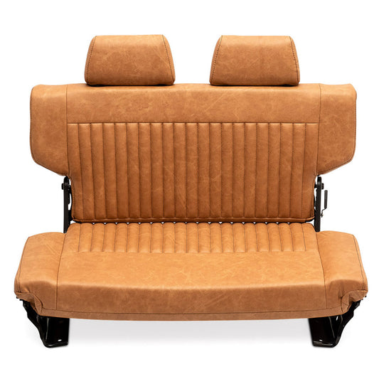 Brown deerskin rear fold seat with tumble feature, side view