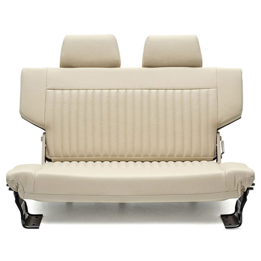 Beige rear fold seat with stitched upholstery and tumble design, side view
