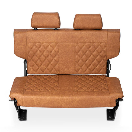 Brown deerskin seat with diamond stitching, folded design for rear bench, side view