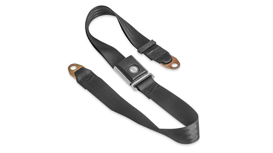 Black lap seat belt with silver mounting bolts for classic Ford Bronco, close-up detail shot