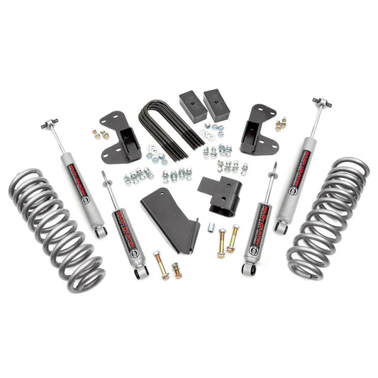 Black steel lift kit with shock absorbers and mounting brackets, side view