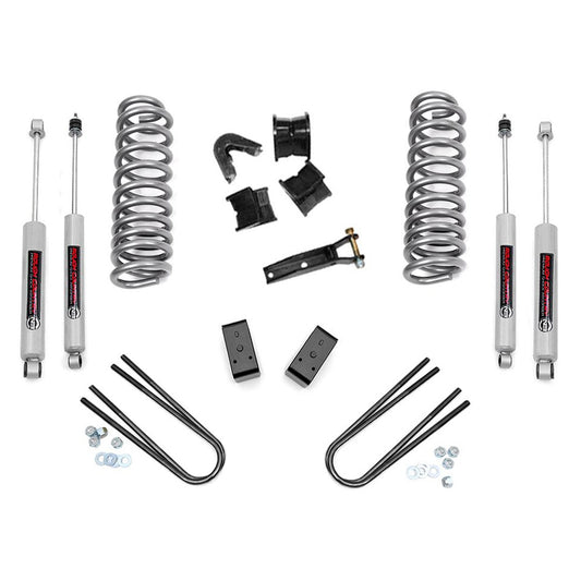 Black steel rear lift blocks with U-bolts for Ford truck suspension, side view