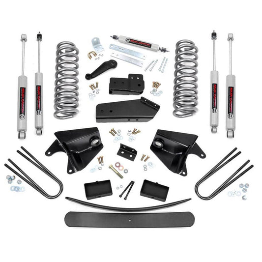 Black steel rear lift blocks with U-bolts for Ford trucks, side view