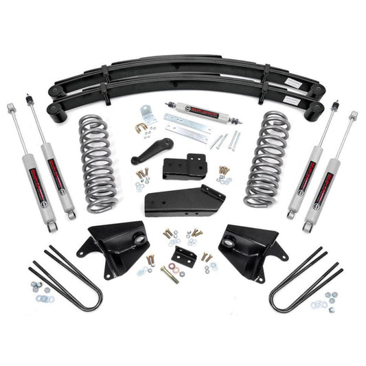 Black steel rear lift springs for truck suspension, side view